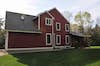 Red siding installed on large single family home in 1997